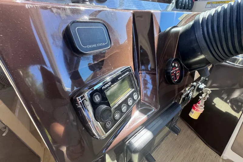 Slide: The Image of Control panel of a 2015 Regal 28 Express boat with engine status display. - 51