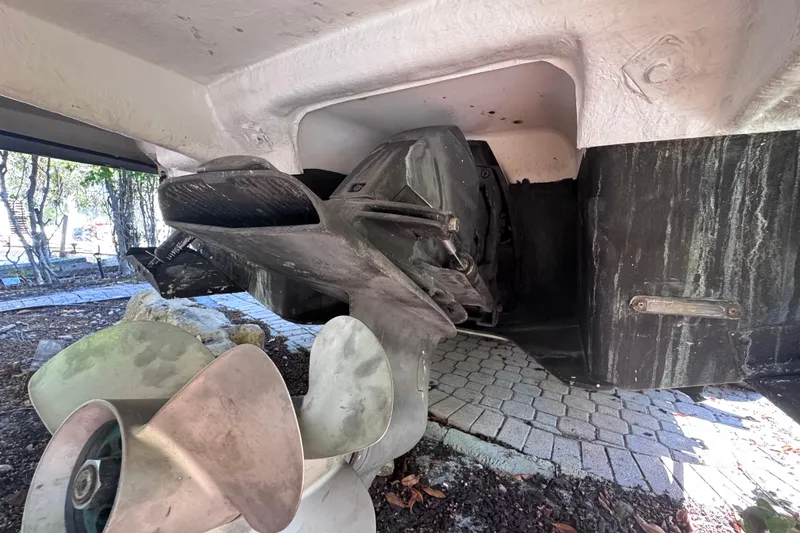 Slide: The Image of 2015 Regal 28 Express boat propeller and stern drive detail. - 76