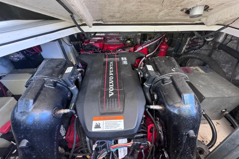 Slide: The Image of Engine compartment of a 2015 Regal 28 Express boat with Volvo Penta engine. - 78