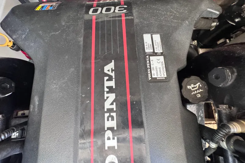 Slide: The Image of Volvo Penta engine in a 2015 Regal 28 Express boat, showcasing model details. - 79