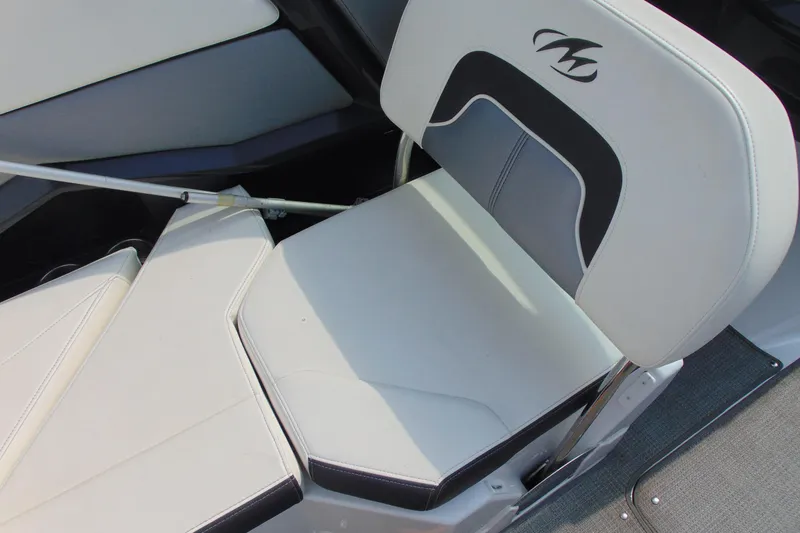 Slide: The Image of 2015 Monterey 238SS boat seat with white and gray upholstery. - 14
