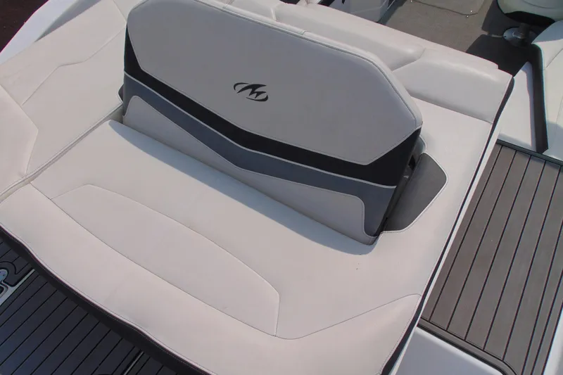 Slide: The Image of 2015 Monterey 238SS boat seat with sleek white and gray upholstery design. - 15