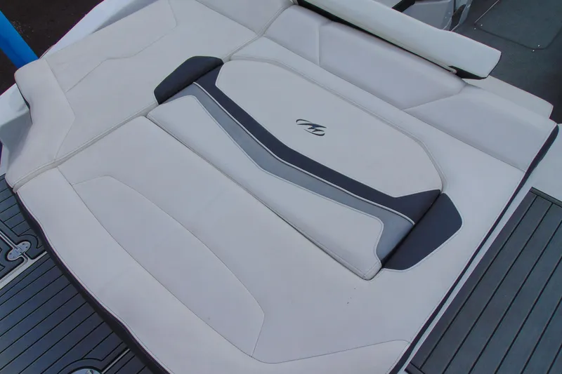 Slide: The Image of 2015 Monterey 238SS boat interior with cushioned seating and sleek design. - 8