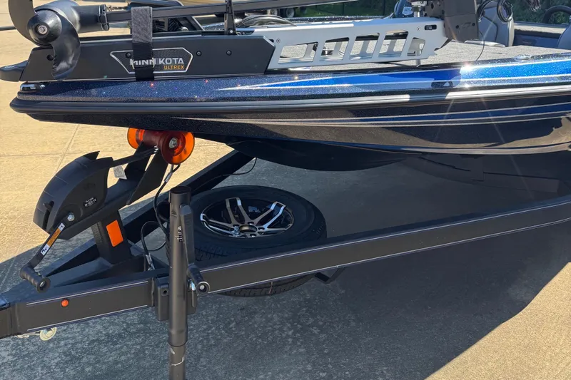 Slide: The Image of 2024 Skeeter ZX 150 boat on trailer with Minn Kota Ultrex motor. - 5
