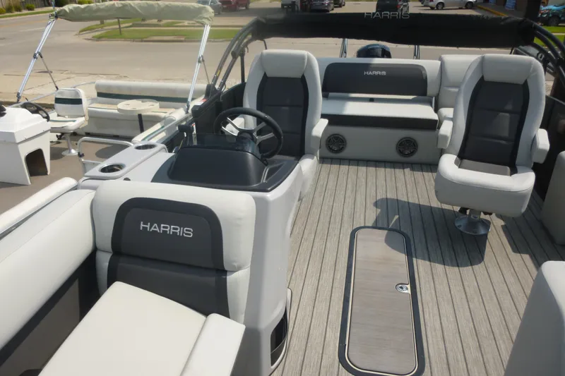 Slide: The Image of Luxurious 2025 Harris pontoon boat interior with plush seating and modern design. - 5