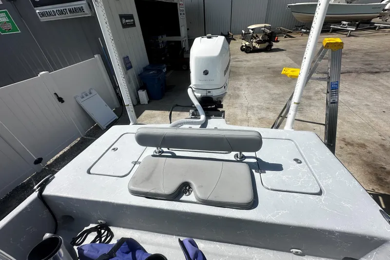 Slide: The Image of 2022 Haynie 25 Magnum boat at Emerald Coast Marine, featuring a sleek design and powerful engine. - 7