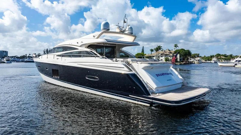 Slide: The Image of Luxurious 2010 Princess V78 yacht cruising on a sunny day, featuring sleek design and elegance. - 17