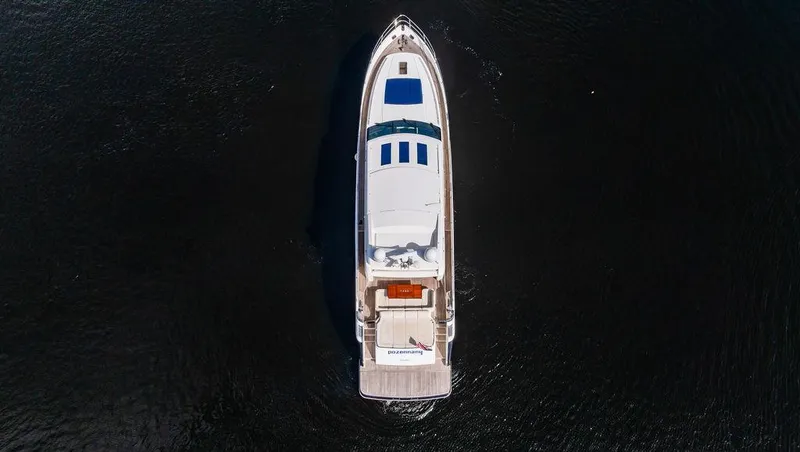 Slide: The Image of Aerial view of 2010 Princess V78 yacht on dark water. - 3