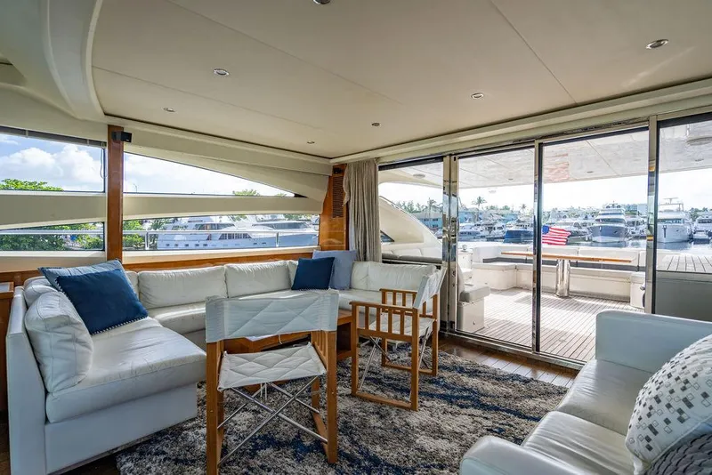 Slide: The Image of Luxurious 2010 Princess V78 yacht interior with elegant seating and marina view. - 35