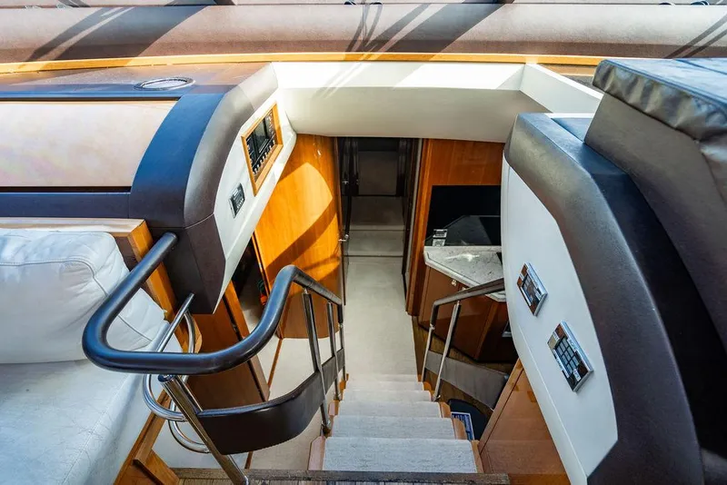 Slide: The Image of Interior staircase of 2010 Princess V78 yacht, featuring sleek design and modern finishes. - 37