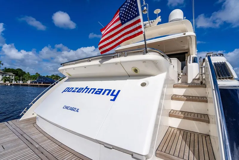 Slide: The Image of Luxury yacht Princess V78, 2010 model, docked with American flag. - 46
