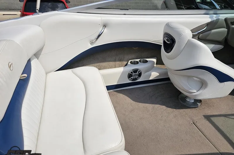 Slide: The Image of Interior of a 2007 Crownline 23 SS boat with white and blue seating. - 44