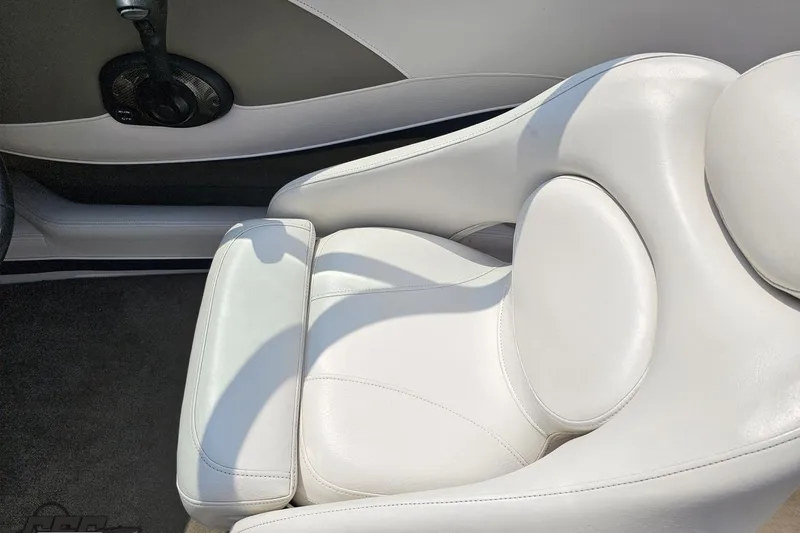 Slide: The Image of Luxurious white leather seat in 2007 Crownline 23 SS boat interior. - 54