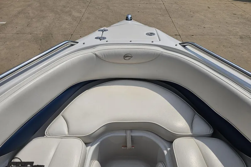 Slide: The Image of 2007 Crownline 23 SS boat interior with white cushioned seating and sleek design. - 69