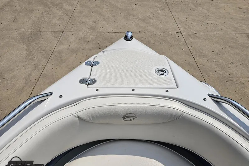 Slide: The Image of 2007 Crownline 23 SS boat bow with white seating and stainless steel railings. - 70