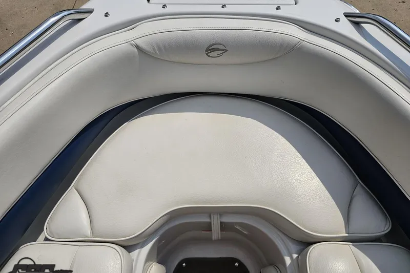 Slide: The Image of 2007 Crownline 23 SS boat interior with white leather seating and logo detail. - 71
