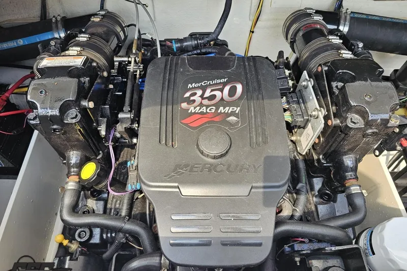 Slide: The Image of MerCruiser 350 MAG MPI engine in a 2007 Crownline 23 SS boat. - 82