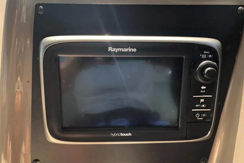 Slide: The Image of Raymarine Hybridtouch display on 2006 Rinker 342 Express Cruiser dashboard. - 18