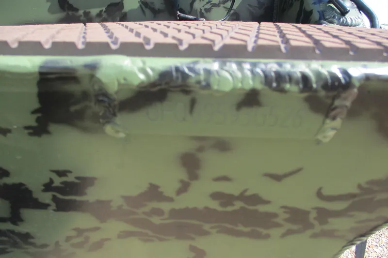 Slide: The Image of Close-up of 2026 Gator Tail 1854 Extreme camouflage pattern and textured surface. - 12