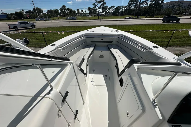 Slide: The Image of 2026 Sea Pro 240 Dual Console boat interior with spacious seating and sleek design. - 5