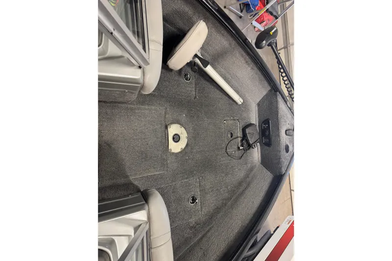 Slide: The Image of 2017 Tracker Pro Guide V-175 Combo boat interior with gray carpet and seating. - 13