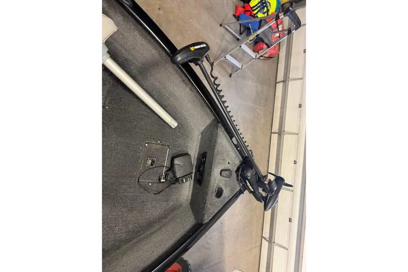 Slide: The Image of 2017 Tracker Pro Guide V-175 Combo boat interior with trolling motor and equipment. - 14