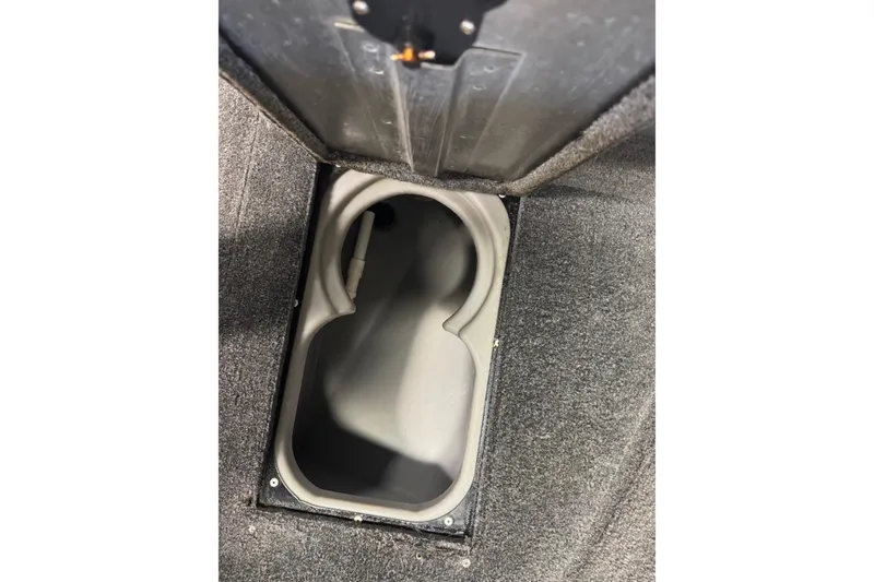 Slide: The Image of 2017 Tracker Pro Guide V-175 Combo boat storage compartment, gray interior. - 16