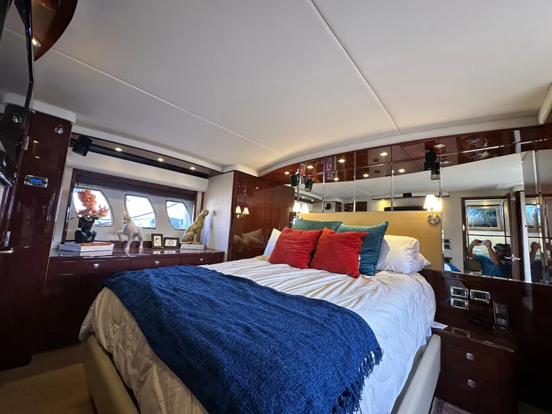 Slide: The Image of Luxurious bedroom interior of 2009 Sea Ray 60 Sundancer yacht with elegant decor. - 21