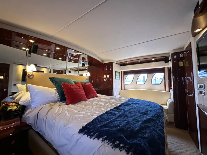 Slide: The Image of Luxurious bedroom interior of 2009 Sea Ray 60 Sundancer yacht with elegant decor. - 22