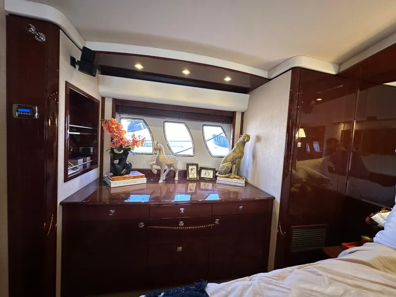 Slide: The Image of Luxurious interior of 2009 Sea Ray 60 Sundancer yacht with elegant decor and wood finish. - 25