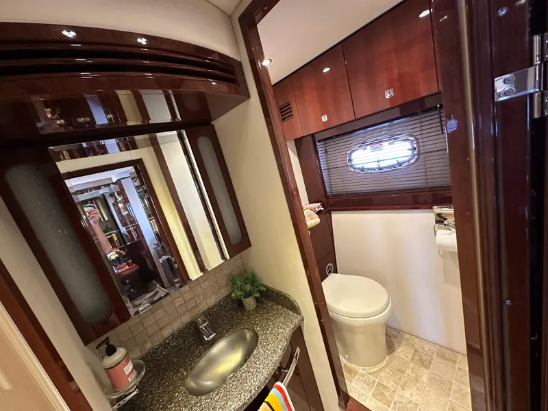 Slide: The Image of Luxurious bathroom interior of 2009 Sea Ray 60 Sundancer yacht with modern fixtures. - 26