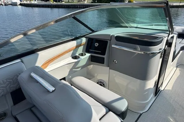 Slide: The Image of 2026 Regal LS9 boat interior with sleek design, luxurious seating, and modern dashboard. - 4