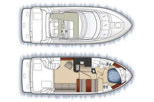 Slide: The Image of 2005 Carver 33 Super Sport yacht kitchen with microwave, stove, and mermaid wall art. - 14
