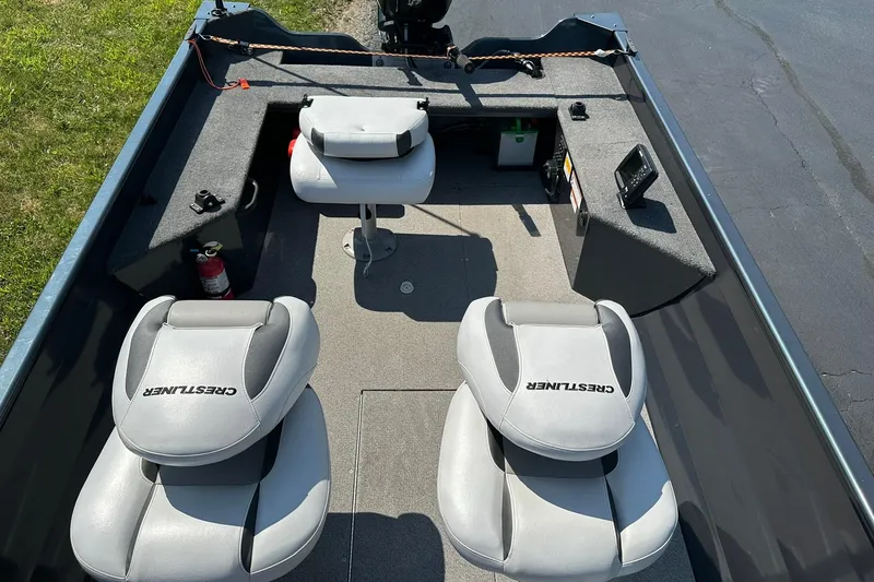 Slide: The Image of 2013 Crestliner 16 Kodiak boat interior with seating and equipment. - 21