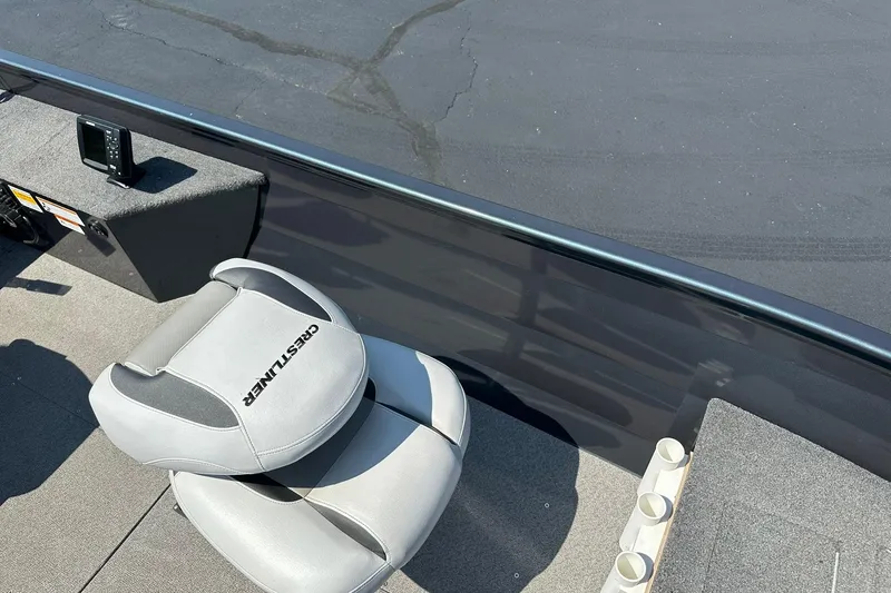 Slide: The Image of 2013 Crestliner 16 Kodiak boat interior with seat and control panel. - 22