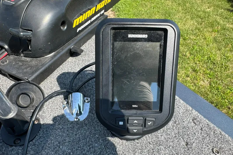 Slide: The Image of Humminbird fish finder on 2013 Crestliner 16 Kodiak boat with Minn Kota motor. - 26