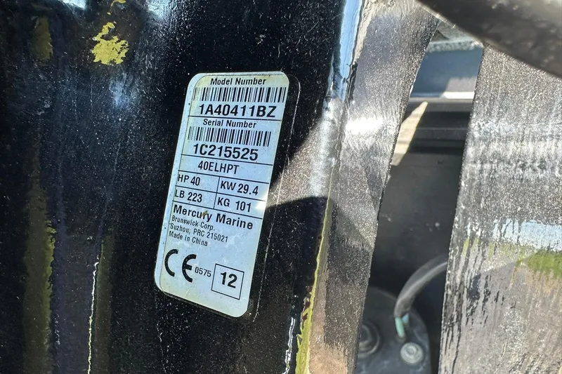 Slide: The Image of Label on a 2013 Crestliner 16 Kodiak boat, displaying model and serial numbers. - 31