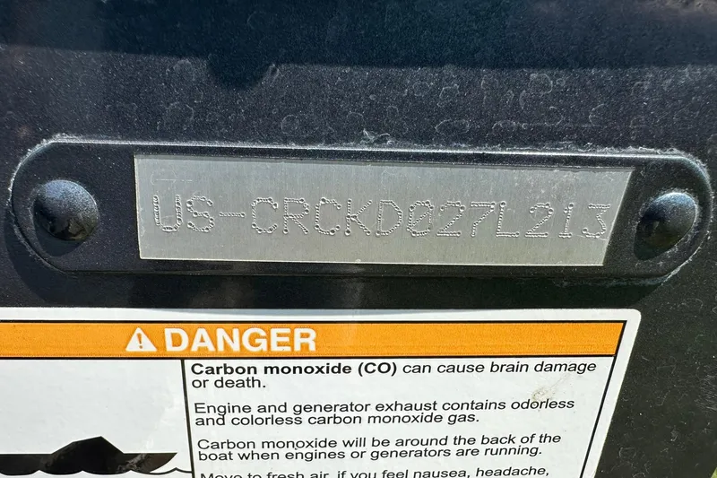 Slide: The Image of 2013 Crestliner 16 Kodiak boat identification plate with carbon monoxide warning label. - 32