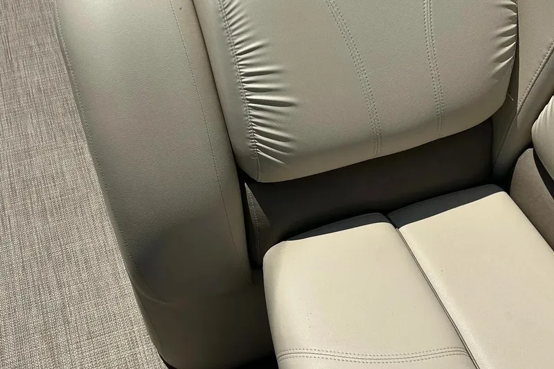 Slide: The Image of Beige leather seating on 2017 Starcraft CX 23 RE boat, showcasing comfort and design. - 38