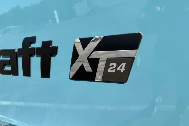 Slide: The Image of 2025 MasterCraft XT24 logo on a light blue surface. - 3