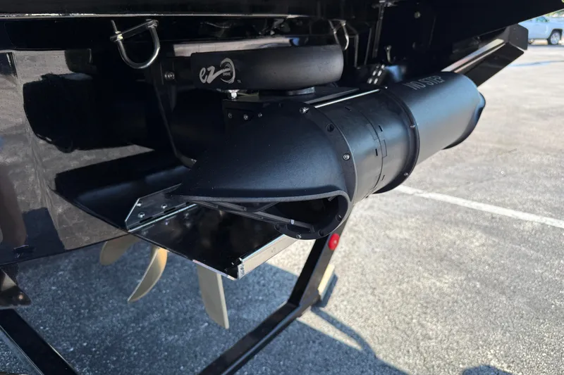 Slide: The Image of 2025 MasterCraft XT24 boat propeller and exhaust system close-up. - 9
