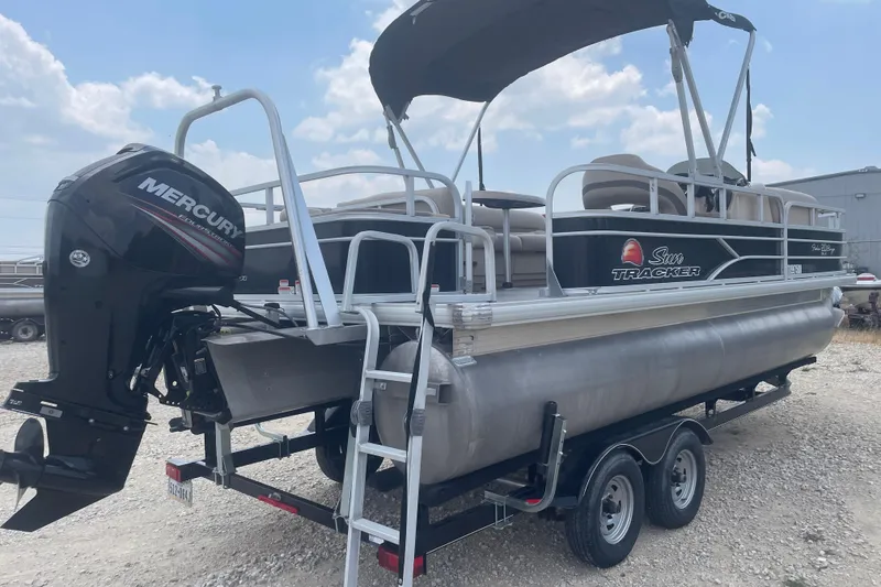 Slide: The Image of 2016 Sun Tracker Fishin' Barge 20 DLX pontoon boat with Mercury outboard motor. - 3