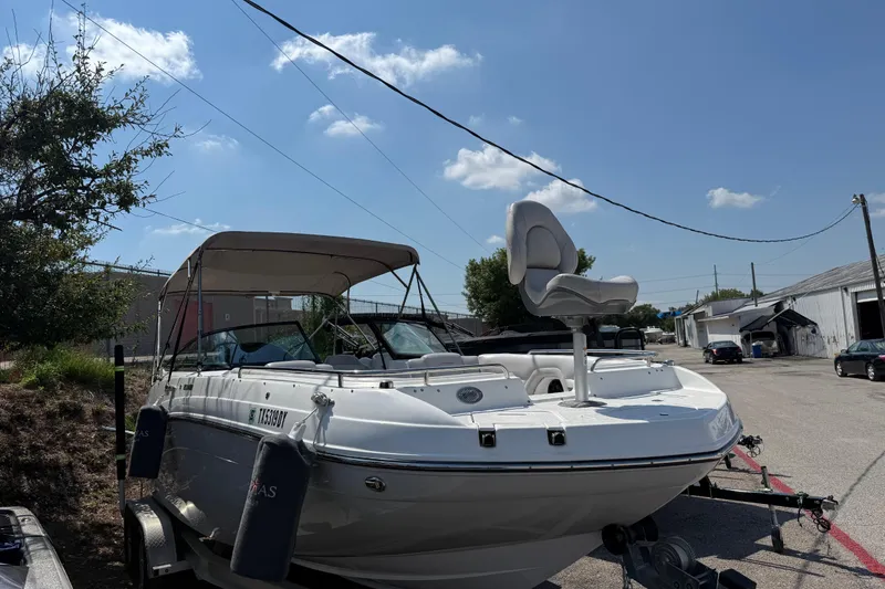 Slide: The Image of 2017 Hurricane SD 2486 boat on trailer with Suzuki outboard motor. - 15