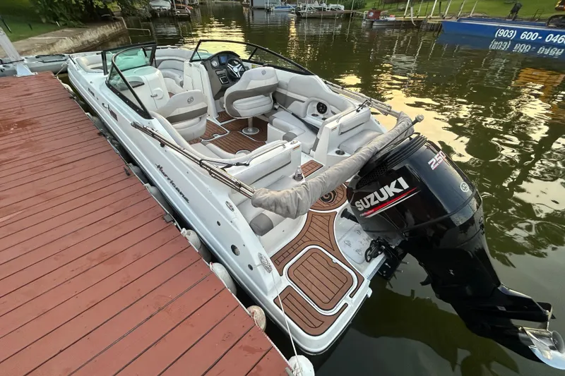 Slide: The Image of 2017 Hurricane SD 2486 boat with Suzuki outboard motor on trailer. - 17