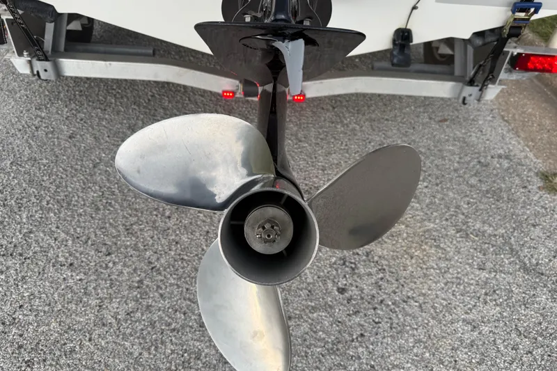 Slide: The Image of 2017 Hurricane SD 2486 boat with powerful 250 HP outboard motor on trailer. - 24