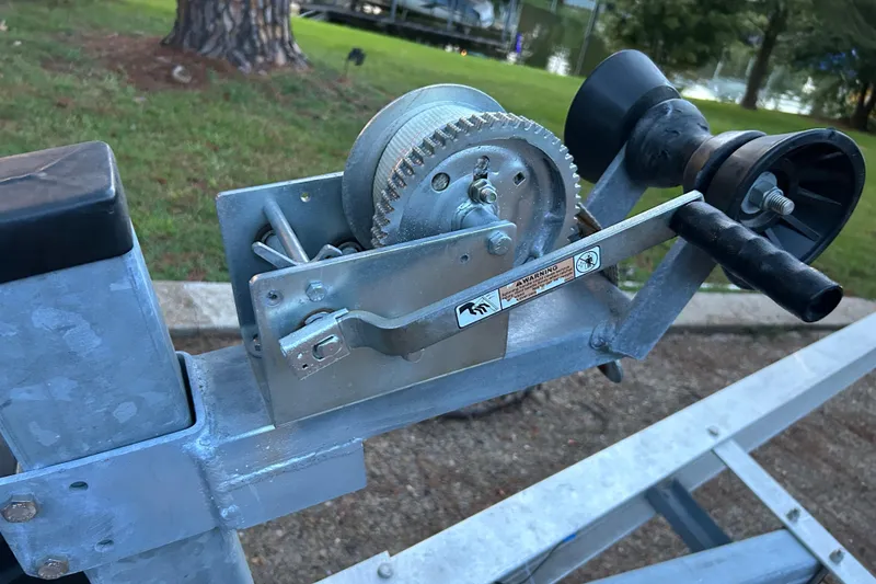 Slide: The Image of Boat trailer parked on driveway, suitable for 2017 Hurricane SD 2486 model. - 28