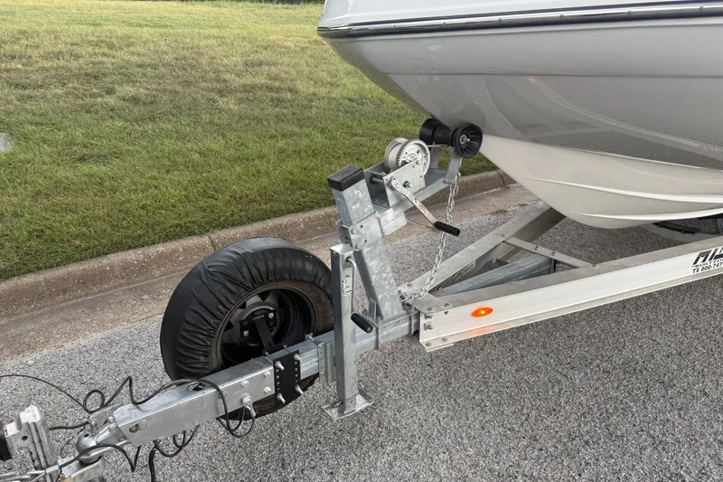 Slide: The Image of 2017 Hurricane SD 2486 Texas Edition boat with sleek design under cloudy sky. - 33