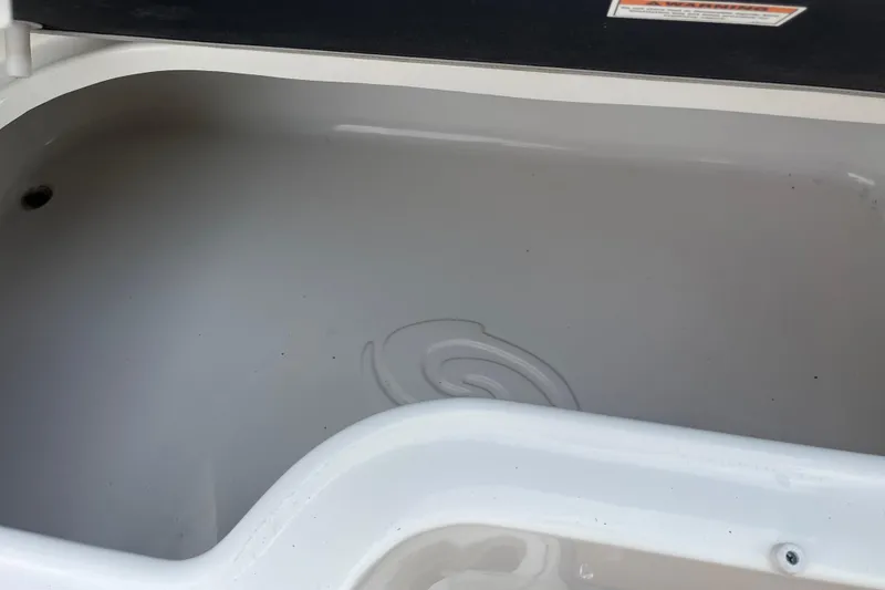 Slide: The Image of Open storage compartment on 2017 Hurricane SD 2486 boat. - 46