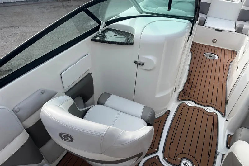 Slide: The Image of 2017 Hurricane SD 2486 boat dashboard with a speckled black surface and windshield wiper. - 57