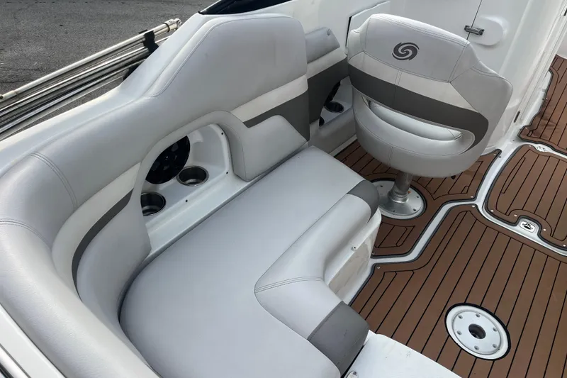Slide: The Image of 2017 Hurricane SD 2486 boat interior with steering wheel and dashboard controls. - 59